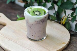 yogurt smoothie, mixed fruit yogurt smoothie or mixed fruit juice with kiwi fruit photo