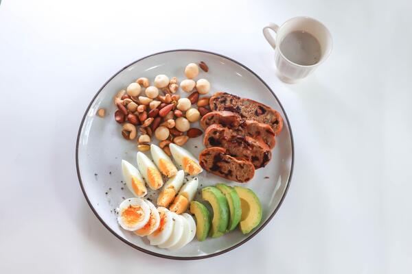 walnut cranberry sourdough bread or cranberry sourdough with boiled egg , avocado and nuts