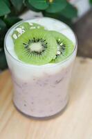 yogurt smoothie, mixed fruit yogurt smoothie or mixed fruit juice with kiwi fruit photo