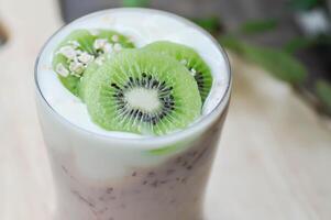 yogurt smoothie, mixed fruit yogurt smoothie or mixed fruit juice with kiwi fruit photo