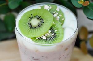 yogurt smoothie, mixed fruit yogurt smoothie or mixed fruit juice with kiwi fruit photo