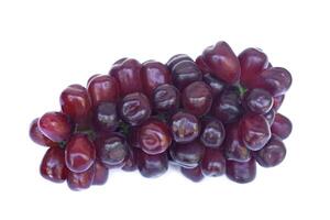 Bunch of fresh seedless red grapes, fruits , white background. Concept, Healthy eating. Agricultural crops. photo