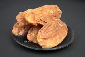 Puri famous sweet khaja in blackground photo