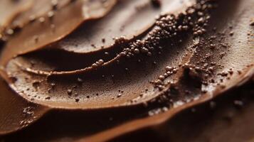 A closeup view of rich mocha mousse, showcasing velvety layers of luxurious chocolate with a glossy finish, delicately topped with fine cocoa granules for an attractive presentation photo