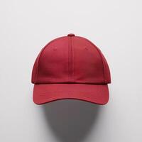 A stylish red cap displayed against a clean white background. photo