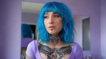 Young woman with blue hair and intricate tattoos conveys individuality and self-expression through alternative style. Portrait concept photo