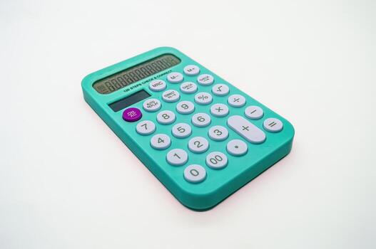 A teal calculator with a large display and various function buttons, including basic arithmetic operations and memory functions, placed on a white background. Ideal for office, school, or home use photo