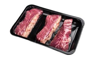Raw Tri Tip Steak from Black Angus beef meat isolated on white background photo