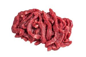 Raw beef meat sliced strips for beef stroganoff isolated on white background photo