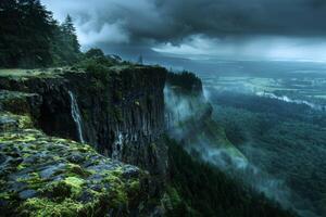 A view of a waterfall and forest on a cloudy day photo