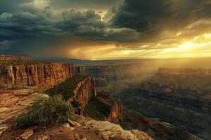 A man standing on a cliff overlooking a canyon photo