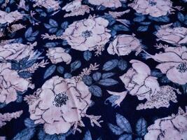A series of abstract multi-colored rose flower patterns in medium color, rose material fabric solid photo