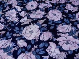 A series of abstract multi-colored rose flower patterns in medium color, rose material fabric solid photo