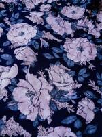 A series of abstract multi-colored rose flower patterns in medium color, rose material fabric solid photo
