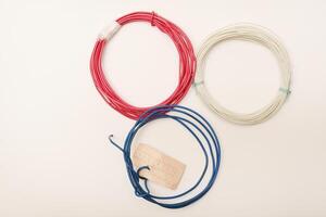 Coils of multicolored wires for electronics. Wires for devices. photo