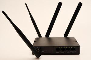 GSM modem. An Internet station with a SIM card. A black router on a white background. photo