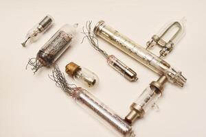 Old lamps from radio electronics. Lamps from calculating devices and lighting. photo