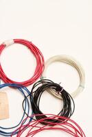 Coils of multicolored wires for electronics. Wires for devices. photo