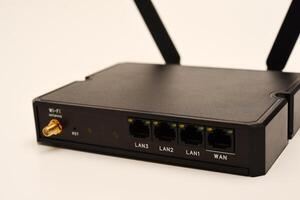 GSM modem. An Internet station with a SIM card. A black router on a white background. photo