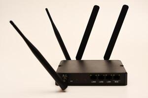 GSM modem. An Internet station with a SIM card. A black router on a white background. photo