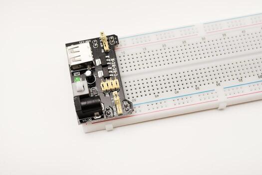 A solderless breadboard for electronics. An assembly tool for radio amateurs. photo