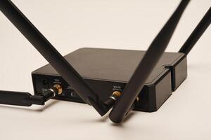 GSM modem. An Internet station with a SIM card. A black router on a white background. photo