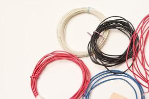 Coils of multicolored wires for electronics. Wires for devices. photo