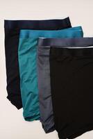 Dark blue men's underpants on a white background. photo