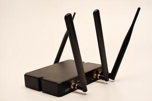 GSM modem. An Internet station with a SIM card. A black router on a white background. photo