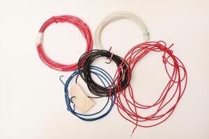 Coils of multicolored wires for electronics. Wires for devices. photo