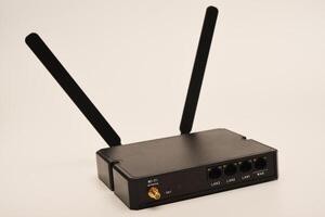 GSM modem. An Internet station with a SIM card. A black router on a white background. photo