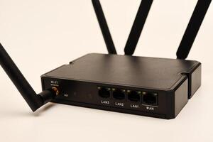GSM modem. An Internet station with a SIM card. A black router on a white background. photo