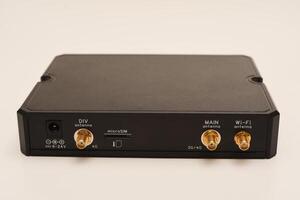 GSM modem. An Internet station with a SIM card. A black router on a white background. photo