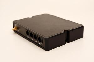 GSM modem. An Internet station with a SIM card. A black router on a white background. photo