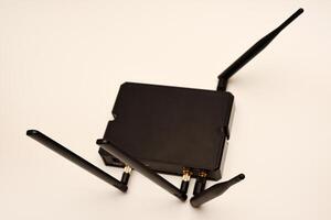GSM modem. An Internet station with a SIM card. A black router on a white background. photo