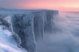 A frozen cliff with ice and snow on top photo