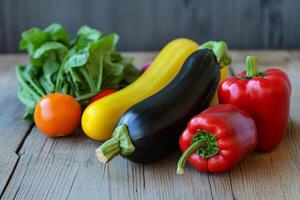 A pile of vegetables on a wooden table photo