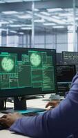 Vertical Data scientists receive access granted notification while reconfiguring server hub, optimizing it. Team of IT experts ensures data center operates efficiently, successfully eliminating all errors video