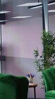 Vertical Empty office space showcases a monitor with financial data during meetings, running detailed infographics in a high end decorated workspace. Develop business strategies for success. video