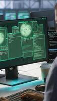 Vertical Cybersecurity team monitoring security incidents, alerted by security breach alert, working together to get rid of virus, protecting infrastructure from threats, camera A video
