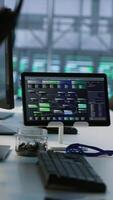 Vertical Data center facility employing deep learning technology to maintain company network infrastructure. Neural networks tech used in server room to ensure optimal system performance, handheld camera shot video