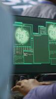 Vertical Happy data center employee pleased after successfully installing cybersecurity framework, seeing confirmation after reducing security incidents and enhancing data protection protocols, camera A video