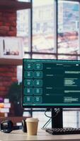 Computer setup in bright IT development workspace showing large language model program. PC in home office with AI LLM chatbot answering user prompts using neural network tech video