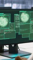 Vertical Admin in server hub trying to protect gear from hacker attack stealing sensitive information. Data center employee struggling to erase virus after seeing security breach alert on monitor, camera A video