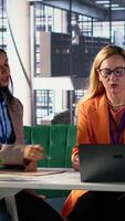 Vertical Diverse women executives in a modern office discussing business growth, career development and gender equality. Powerful leaders in action uniting forces to expand the enterprise. Camera A. video