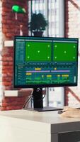 editor selecting key frames to use while doing montage, working from home on green screen computer. Man using mouse to edit movie project footage on chroma key PC in apartment, camera B video