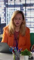 Vertical Corporate leaders demonstrating powerful collaboration and strategic thinking, share insights and big ideas in a briefing meeting. Women strategizing for growth fostering diversity. Camera A. video
