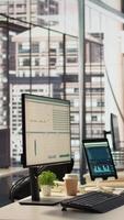 Vertical Empty business workplace equipped with modern tech tools to serve an enterprise, workspace in a high end city center corporation. Global organization luxurious corporate culture. video