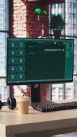 Focus on AI LLM chatbot GPT software on PC monitor in modern home office. Panning shot of large language model application on computer display communicating with user through artificial intelligence video