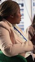Vertical Multiethnic leaders in a business meeting brainstorming growth strategy searching for enterprise expansion opportunity. CEO sharing the new idea to the investors group, strategic thinking. Camera A. video